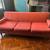 1960s orange mid century sofa with lots of character 1 thumbnail