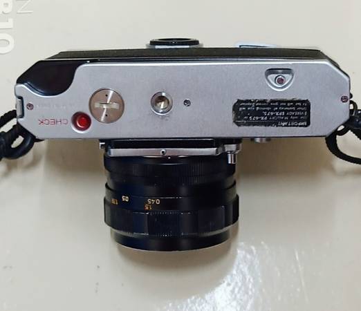 Konica Autoreflex T with 52mm lens (35mm film camera) ). - $130 (Downtown)63471379007745124