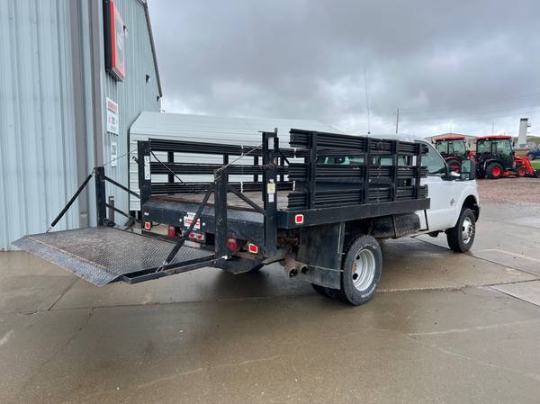 2012 Ford F-350SD XL Reg. Cab DRW 4x4 Diesel 9' Stake Bed w/Tommy Lift - $27,927 (Rapid City)63442874778113123