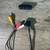 PlayStation 1 with two controllers and AV cable 17 thumbnail