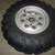 2003 Suzuki Vinson 500 Front 4/110 Rim Wheel 25X8-12 Tire 1 thumbnail