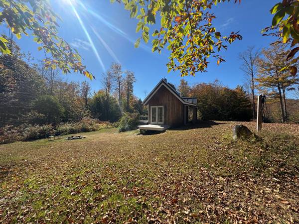 $398,000 / 2br - Wonderful Modern Cottage on 9 private acres with Brook frontage (Plainfield)63976978865282124