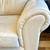 Leather Sofa-Ashley Furniture-Cream Color. 3 Seat with Cherry Color Wood Trim- U 4 thumbnail