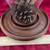 Decorative Hurricane Globe With Wooden Base Filled With Pine Cones 2 thumbnail