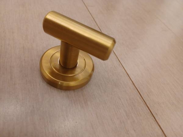 Wall mounted Gold Hook.  NEW! 1