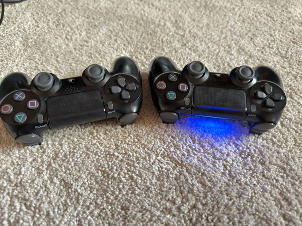 PS4 2018 console with 2 Dual shock controllers, 2 Games 1