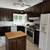 Kitchen: Cabinets, Refrigerator  Oven, Sink, Rolling Cabinet, Desk 1 thumbnail