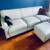 Baby blue leather sofa and ottoman. 1 thumbnail