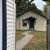 2 Bedroom, with sun porch and a nice fenced in back yard with a 2 car 15 thumbnail
