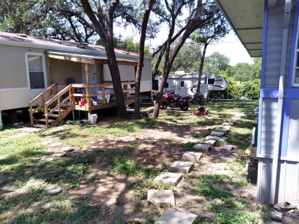 $350,000 0.34 acre wooded lot,no restrictions 2015 mobile and older mobile wi (S. Austin)63922557830019123
