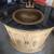 small brass sink mounted in a half moon vanity with black stone top 10 thumbnail