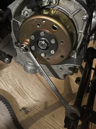 Anyone available that can remove a flywheel nut 1