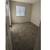 Soft hued paint accented with white paneled doors, Carports available 11 thumbnail