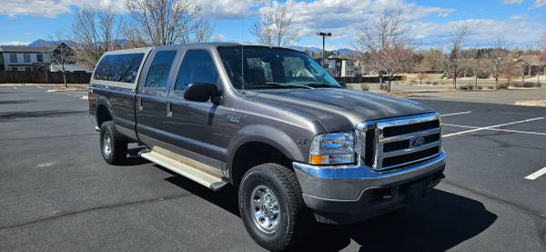 2004 Ford F350 Crew Cab XLT  4x4 V-10 Gas Auto Topper 114k Miles - $13,950 (Golden)63612190511489124