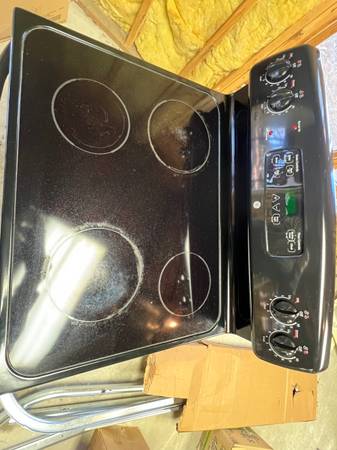 General Electric-Black Flat Top Stove 1