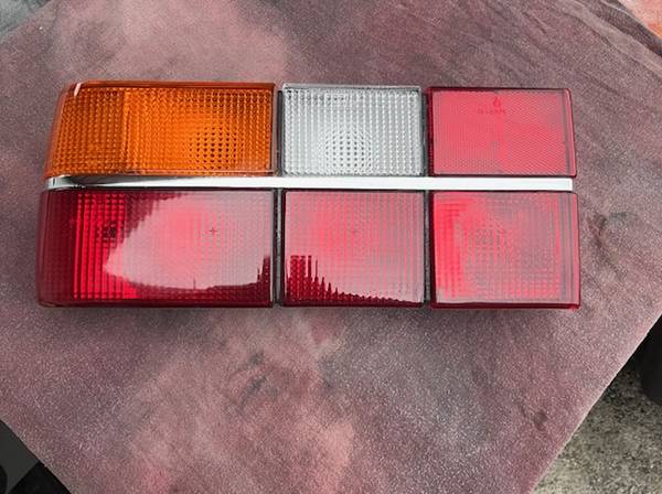 Volvo 240 series; driver rear tail light assembly, NEW, open box 1