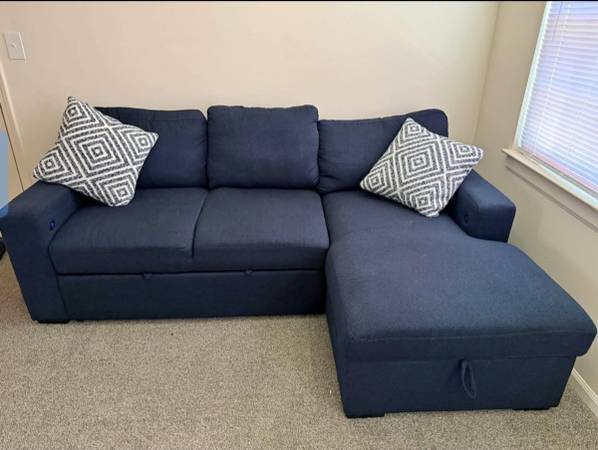 Small Sleeper sectional Dark blue with charging ports and pillows 1