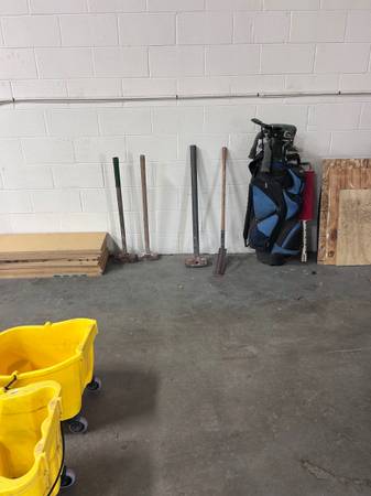 Various tools, sledgehammers, drywall sanders, sickle, digging tools 1