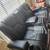Black Dual Powered Reclining Love Seat 1 thumbnail