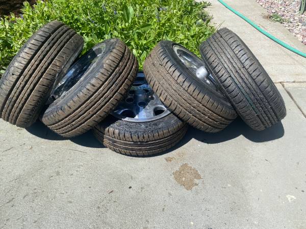 5 New 155X55X14" tires on 14X115mm wheels. 1