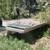 2 AXLE SNOW MOBILE TRAILER WITH RAMPS BUDDY BEARINGS NEED NEW WOOD ON 2 thumbnail