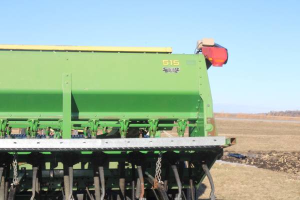 (2) JD 515, 3 Pt. Grain Drills, a 530 JD Cart, 10" Spacers 1