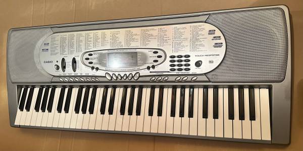 Casio CTK-574 w/stand and power supply - $40 (Columbus)63470271931521121