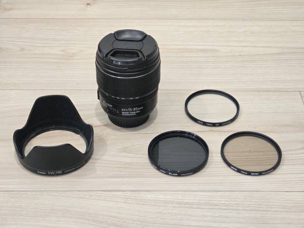 Canon 15-85mm IS lens with hood, Hoya filters (UV, warming, polarizer) 1