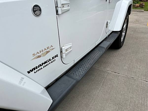 2015 Jeep Wrangler Unlimited Sahara - $17995.0063622178379009124