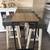 Bar-height table with 3 matching stools for sale. 1 thumbnail