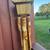 Handcrafted bamboo wind chime with a thatched-roof birdhouse top. 3 thumbnail