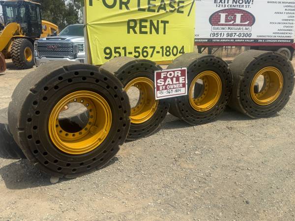 CATERPILLAR 938M SOLID TIRES AND WHEELS 1