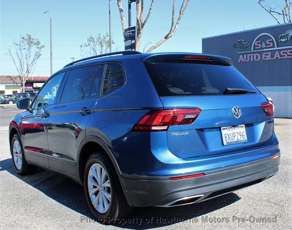 2019 *Volkswagen* *Tiguan* 2.0T S FWD* Azul Seda Metálico - $13.995 (Concesionario sin cargo por basura)63441052495107124