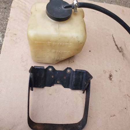 60s Chevy radiator / washer fluid reservoir with mounting bracket 1