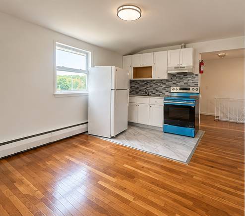 Beautiful 2BR 2nd Floor Apt – Hardwood Floors – ALL Utilities Included 1