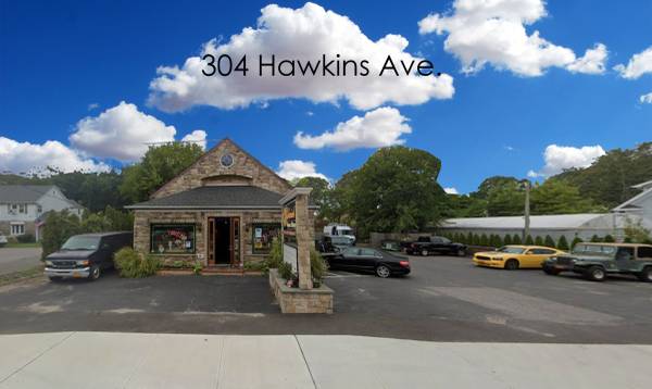 For Sale: Mixed-Use Retail Property with Building & Parking 1
