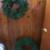 2 lighted plug in wreaths - both $20 1 thumbnail