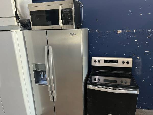 Stainless steel kitchen appliance package. 1