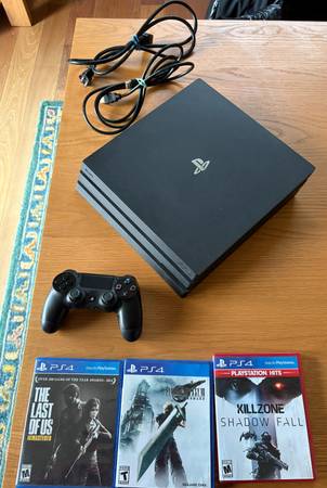 PS4 Pro 1TB with 3 games 1
