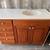 48"W Med Brown Bathroom Vanity W/ White Laminate Top Used Good Cond 2 thumbnail