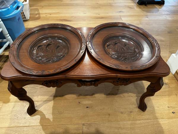 Coffee table with ship carvings and removable glass tops 1