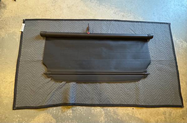 Rear cargo shade for a 2003 Jeep Liberty 1