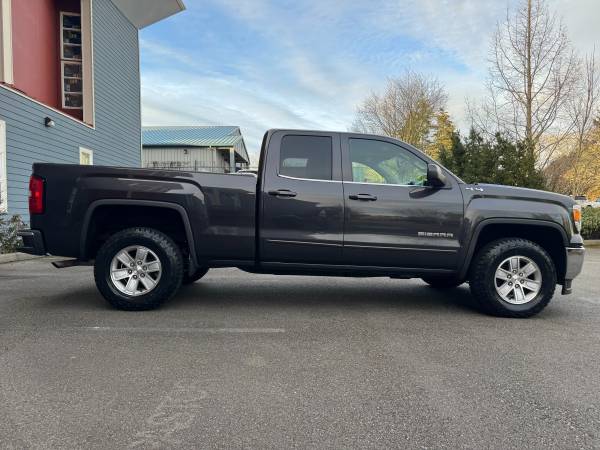 2014 GMC Sierra 4x4 SLE in great shape>>>Only 118K<< BRAND NEW TIRES<< - $18,995 (Daily Deals Auto Sales Lynnwood)63617157393537121