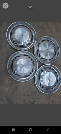 14 "Oldsmobile hubcaps mid sixties 1