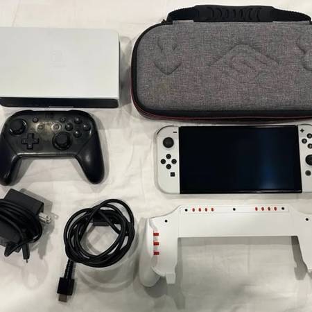 Nintendo Switch OLED Complete Bundle With 2 Pro Controllers 1