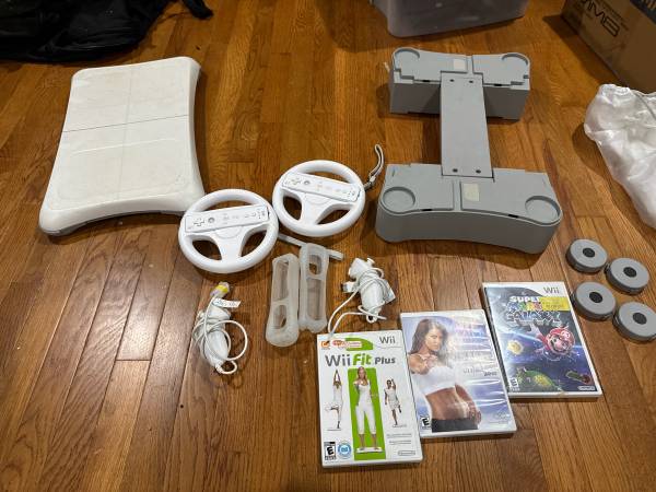 Nintendo wii controlers and fit board and games 1