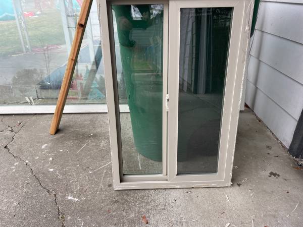 USED Vinyl Sliding Window 23 1/2" W x 35 1/2" H $40 1
