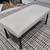 Sturdy Indoor / Outdoor Bench with Black Iron Base and Tan/Cream Color 1 thumbnail