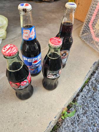 4 Coca cola collectable bottles filled 1