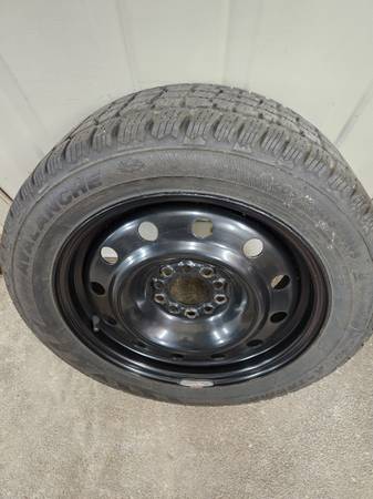 4 dual bolt pattern wheels with snows 1